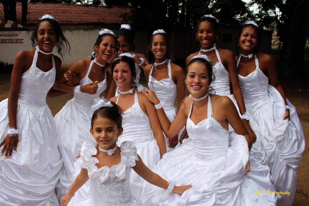 Group of beautiful young ladies accompanying a Quinceañera girl